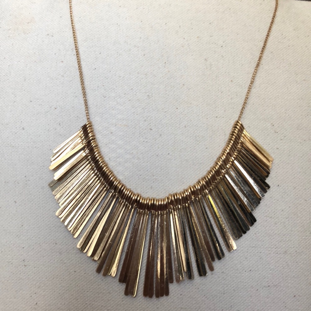 Gold colored necklace